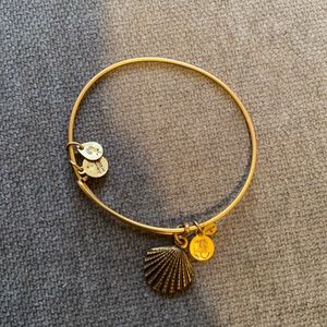 Gold Alex and Ani seashell bracelet.